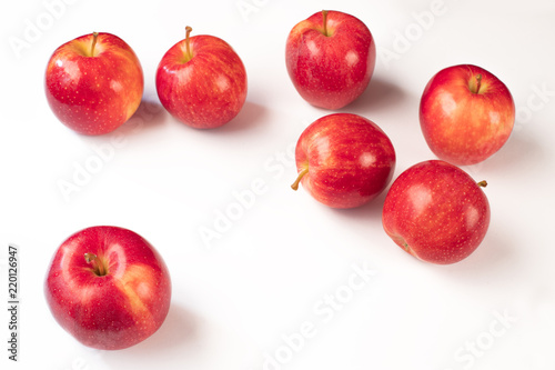 Red ripe apples on a white background. Harvest red apples.