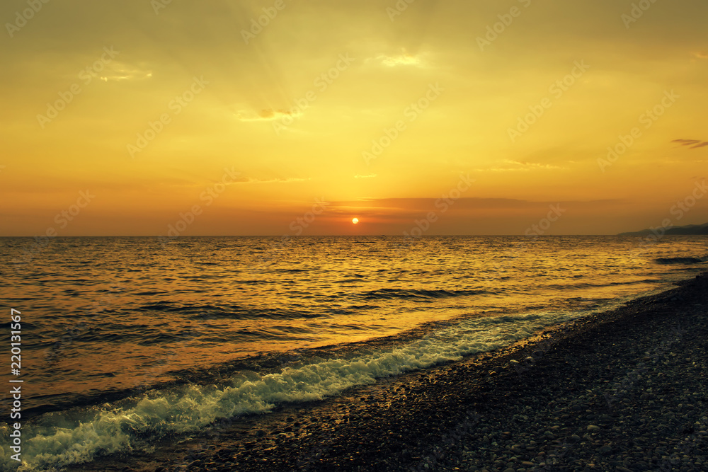 Beautiful sunset on the sea. Summer background.