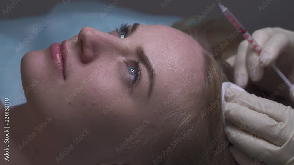 Beautiful girl receives mesotherapy for hair Beautiful girl receives mesotherapy for hair