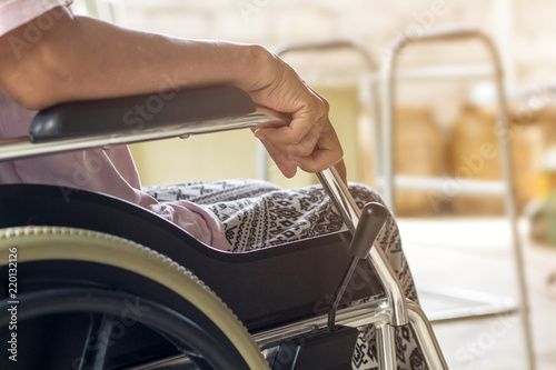 Asian senior or elderly old lady woman patient on wheelchair so sad at home,healthy strong medical concept