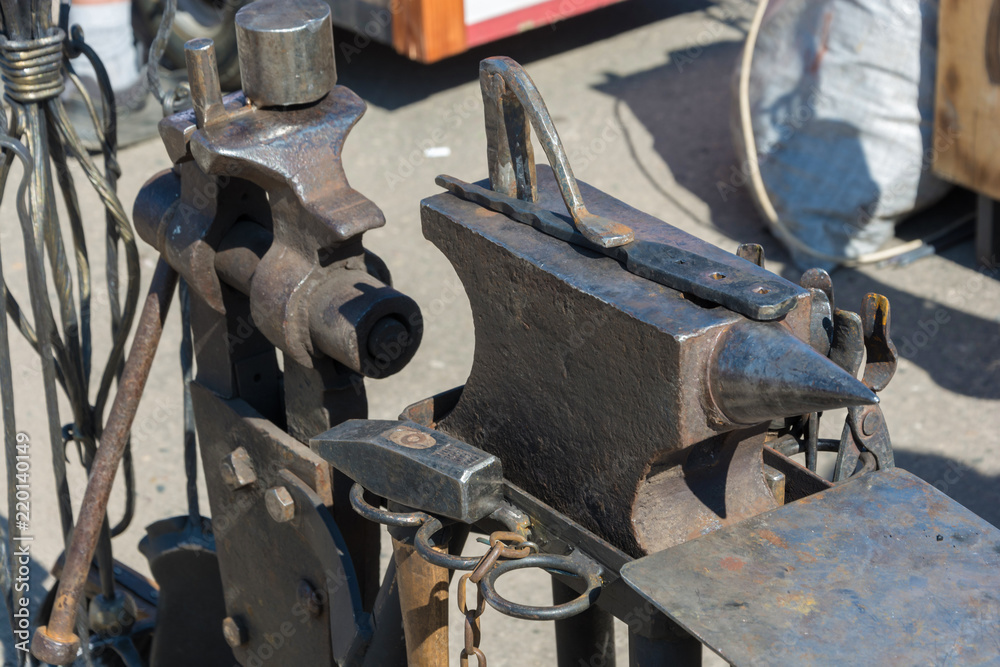 The workplace of the blacksmith - an anvil, a hammer, a vice. The workplace of the blacksmith - an anvil, a hammer, a vice.
