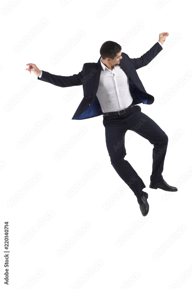 The man is jumping end dancing. Isolated. White background. Presentation. A man in a business suit. He is happy end lucky. The man is jumping end dancing. Isolated. White background. Presentation. A man in a business suit. He is happy end lucky.