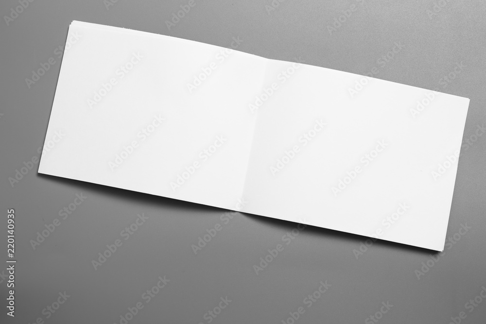 Blank portrait mock-up paper. brochure magazine isolated on gray, changeable background / white paper isolated on gray Blank portrait mock-up paper. brochure magazine isolated on gray, changeable background / white paper isolated on gray
