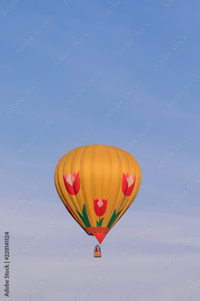 Colorful hot-air balloon flying in the sky Colorful hot-air balloon flying in the sky