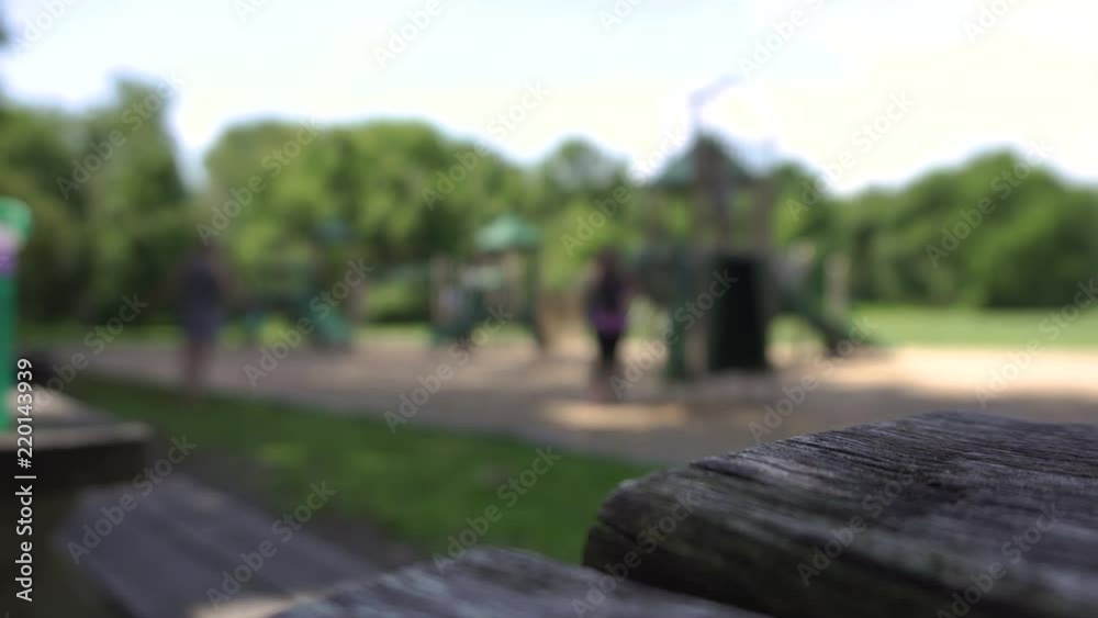 Kids playing on a playground out of focus Kids playing on a playground out of focus
