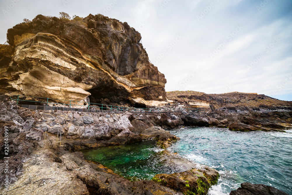 Tenerife, Canary islands, Spain - view of the beautiful Atlantic ocean coast with rocks and stones