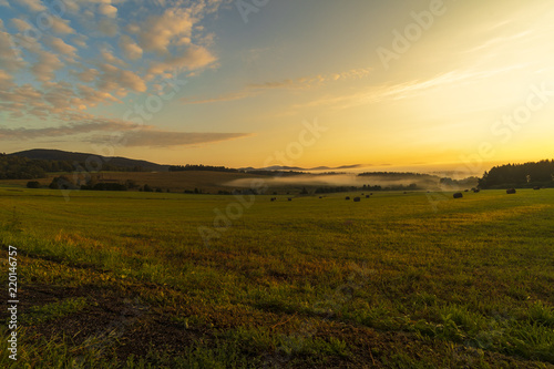 Summer landscape while sunrise in the Czech Republic near the National park of Sumava.