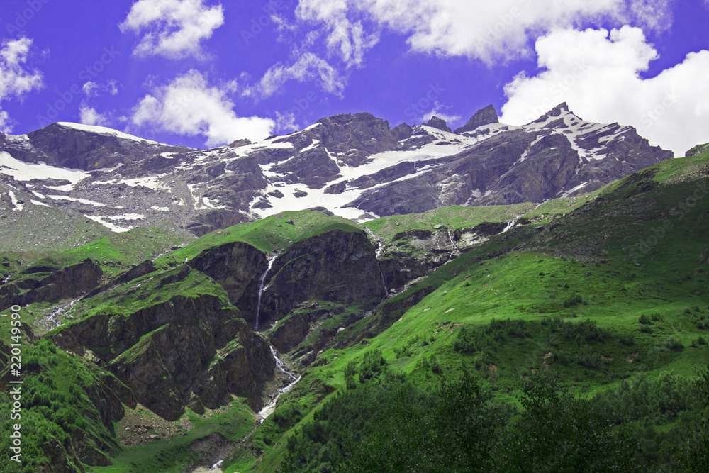Pastoral view on mountains in valley near Elbrus Pastoral view on mountains in valley near Elbrus
