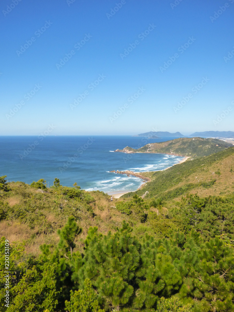 A view of Galheta and Mole beach from a viewpoint at Boa vista hiking path - Florianopolis, Brazil