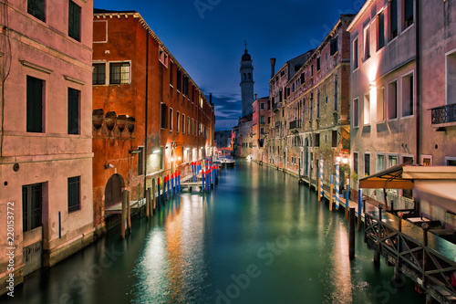 Venice. night view of a lagoon canal with a belfry of a hanging church © michelangeloop