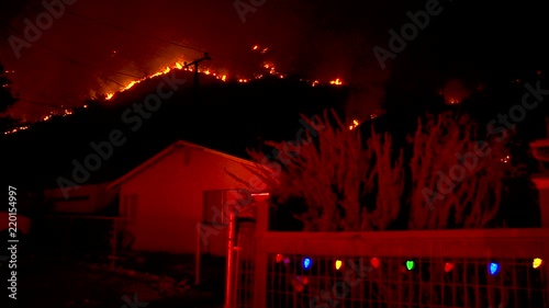 2017 - the Thomas Fire burns in the hills above the 101 freeway near Ventura and Santa Barbara, California. photo