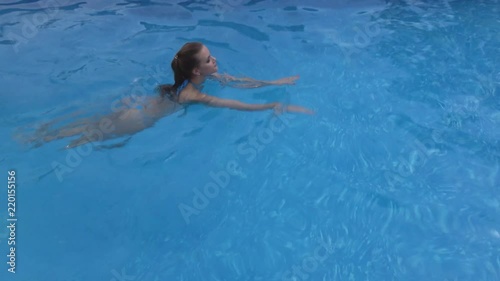 woman bathing in the swimming pool