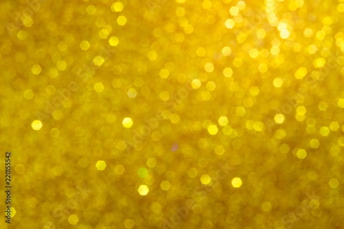 Golden sparkle blur abstract background. bokeh christmas blurred beautiful shiny Christmas lights