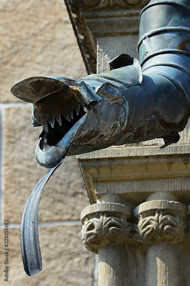 Plate steel gutter spout gargoyle shaped like dragon head with tongue