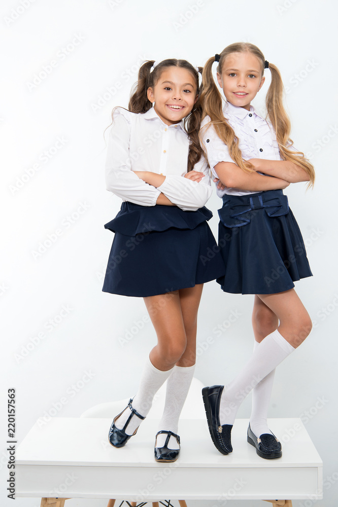Happy girls smile in school uniform. Back to school. Pretty dresses little  curls, thank heaven for little girls Stock Photo | Adobe Stock