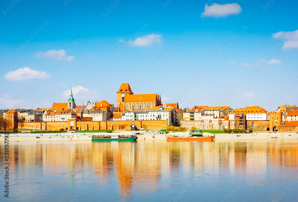 old town of Torun on bank of Vistula river, Poland, retro toned