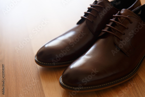 A pair of brown leather shoes