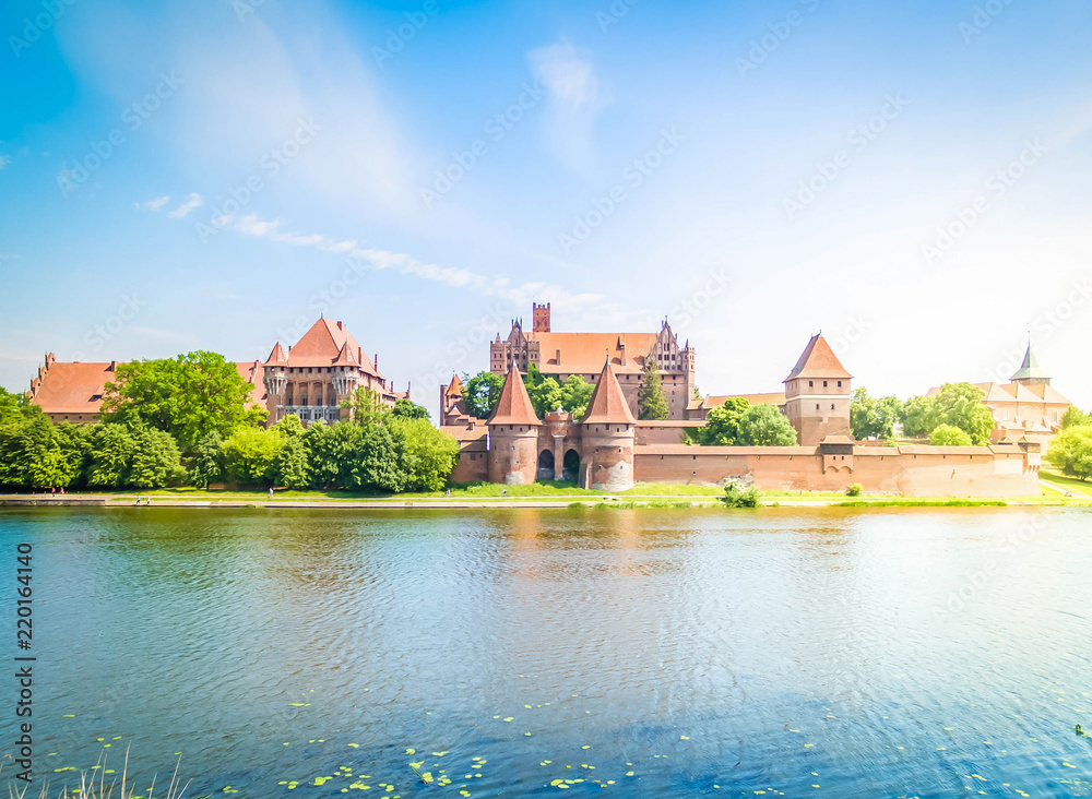 medieval castle of Teutonic Knights in Malbork, Poland, retro toned - obrazy, fototapety, plakaty 