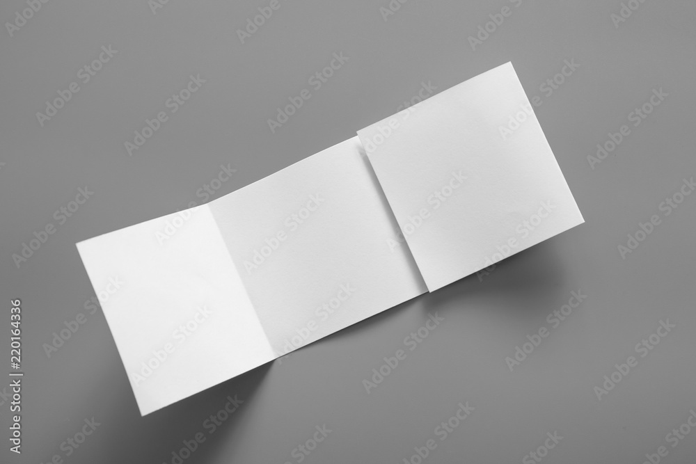 Blank portrait mock-up paper. brochure magazine isolated on gray, changeable background / white paper isolated on gray Blank portrait mock-up paper. brochure magazine isolated on gray, changeable background / white paper isolated on gray