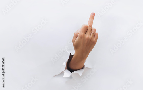 Middle finger, offensive gesture. Fuck you concept. Aggressive reaction.