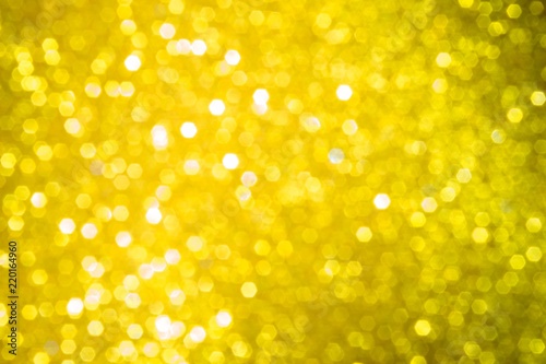 golden blur abstract background. yellow bokeh christmas blurred beautiful shiny Christmas lights