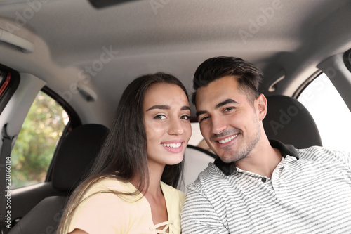 Happy young couple in car on road trip © New Africa