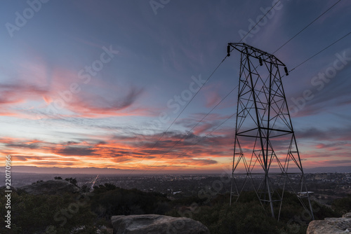 Sunrise view of electric po...