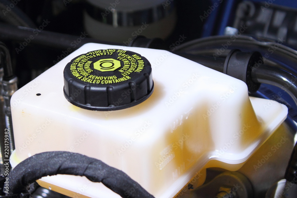 Close-up car tank with brake fluid,