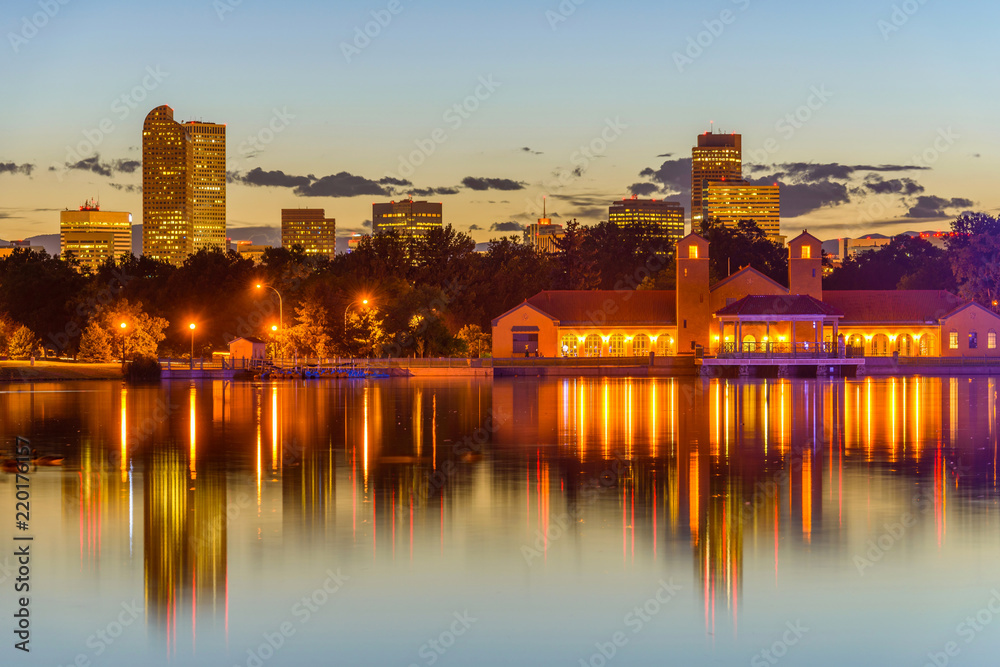City Park at Dusk - A summer evening view of Ferril Lake in Denver City Park, with city skyline in the background, at east-side of Downtown Denver, Colorado, USA.