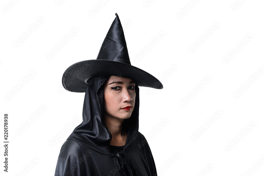 Portrait of woman in black Scary witch halloween costume standing with hat isolated on white background Portrait of woman in black Scary witch halloween costume standing with hat isolated on white background