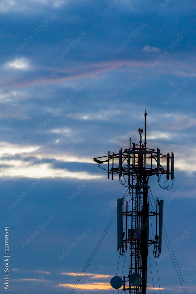 Black silhouette Cellular tower with sky and clouds