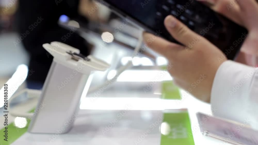 Buying a tablet in a shopping center Buying a tablet in a shopping center