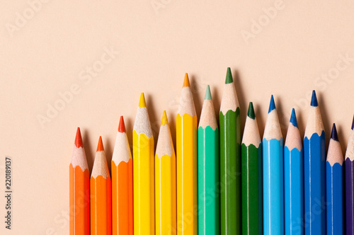 Color pencils isolated on cream background. 