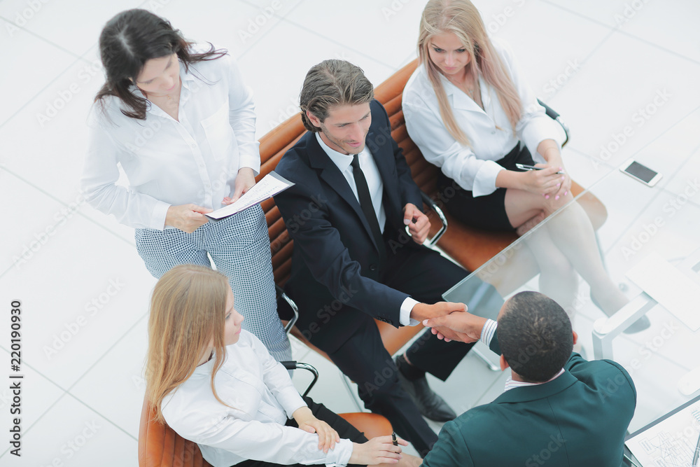 © yurolaitsalbert - handshake of business partners before a business meeting © yurolaitsalbert - handshake of business partners before a business meeting