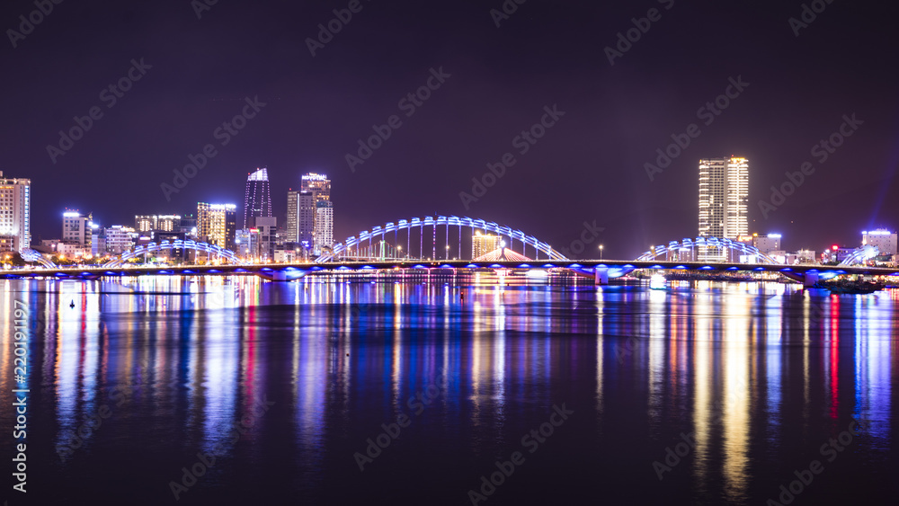 Naklejka premium The dragon bridge at night in the city of Danang, Vietnam.