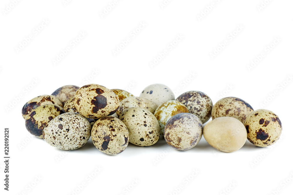 Obraz premium Some quail eggs on a white background