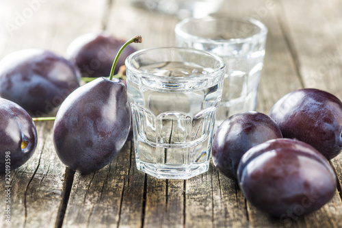 Photography Plum brandy and plums.