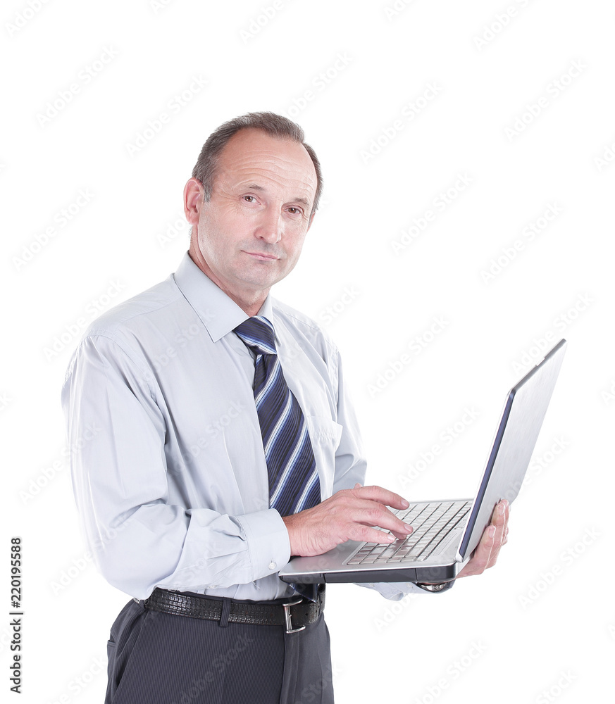 serious businessman with an open laptop serious businessman with an open laptop