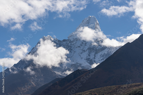 Ama Dablam surrounded by clouds in a morning at Tengboche village  Everest region  Nepal