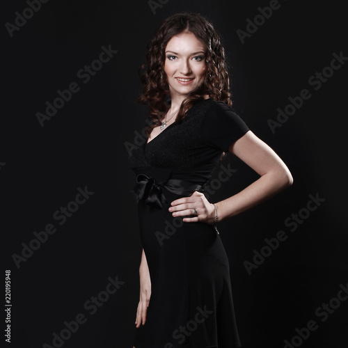 closeup of beautiful young woman in evening black dress