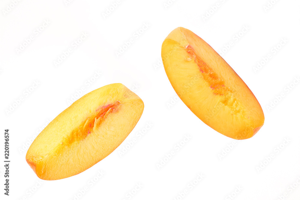 peach fruit slices isolated on white background peach fruit slices isolated on white background