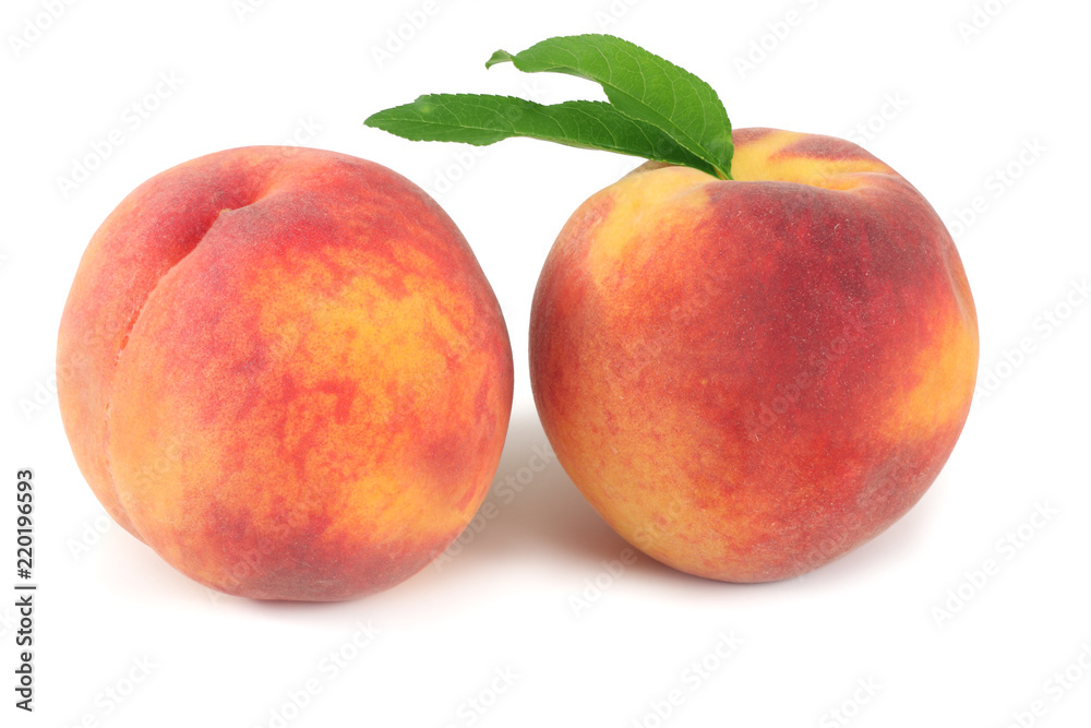peach fruit with green leaf isolated on white background peach fruit with green leaf isolated on white background