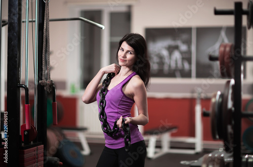 Portrait of confident business woman in the gym