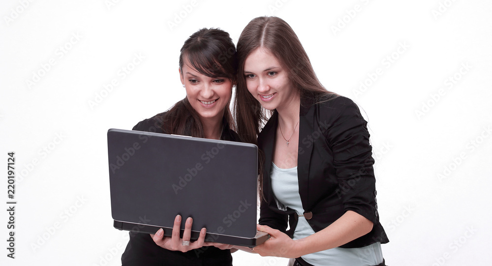 two successful employees looking at laptop screen two successful employees looking at laptop screen