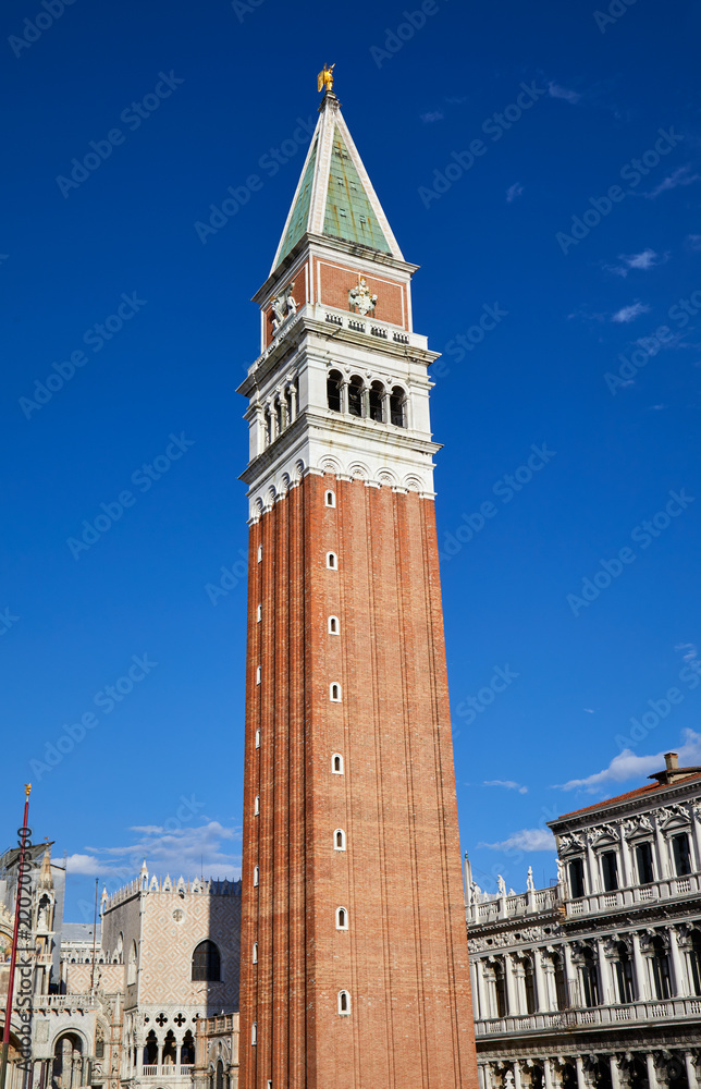 San Marco campanile, bell tower in Venice in a sunny summer day, blue sky