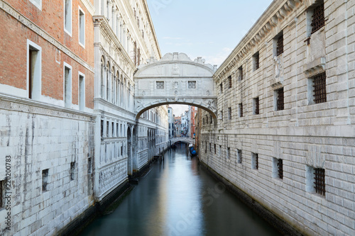 Bridge of Sighs and calm water in the canal, early morning in Venice, Italy