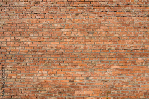 Background of old vintage red brick wall  texture.