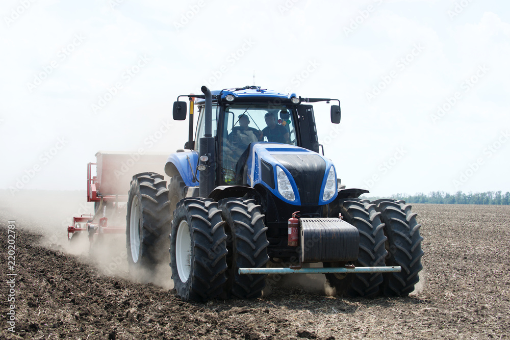 tractor plows a field tractor plows a field