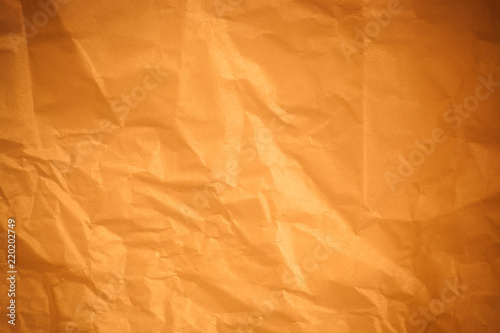 Brown crumpled paper background.