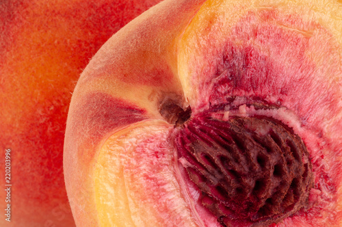 Half cut peach fruit close-up photo